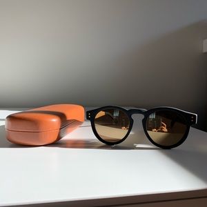 KOMONO Clement Black Rubber and Gold Sunglasses.